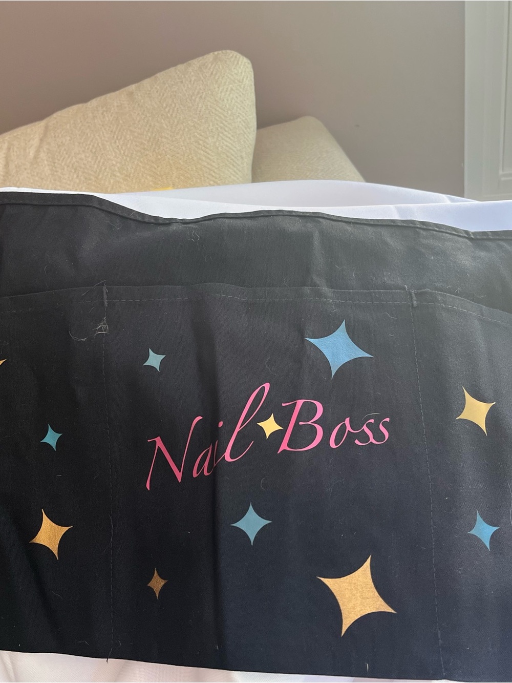 Nail Boss Black Salon Apron with Colorful Star Print